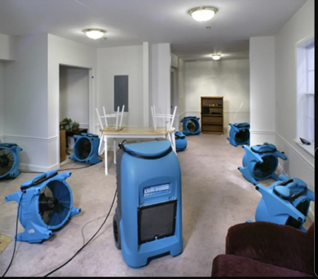 Air movers and dehumidifier setup for Water Extraction & Removal in Oxford